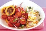 Rezept: Tomatensalat mit Chili-Limetten-Dressing und gebratenem Tintenfisch