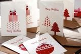 Weihnachtskarten mit roten Applikationen