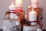 Adventskranz selber machen aus Birkenstämmen und Kerzen