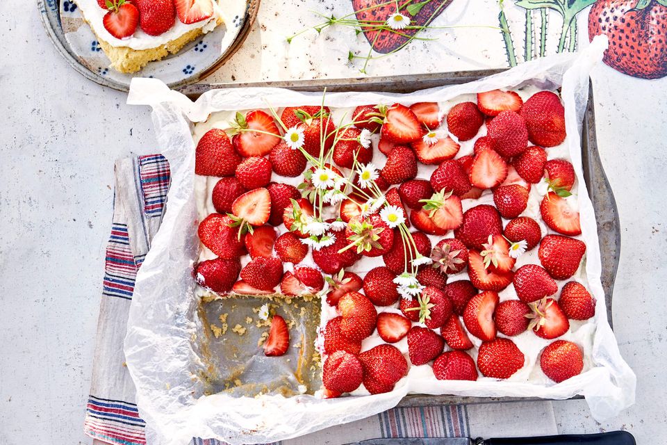 Kuchen mit Ricottacreme und getoppt mit Erdbeeren.